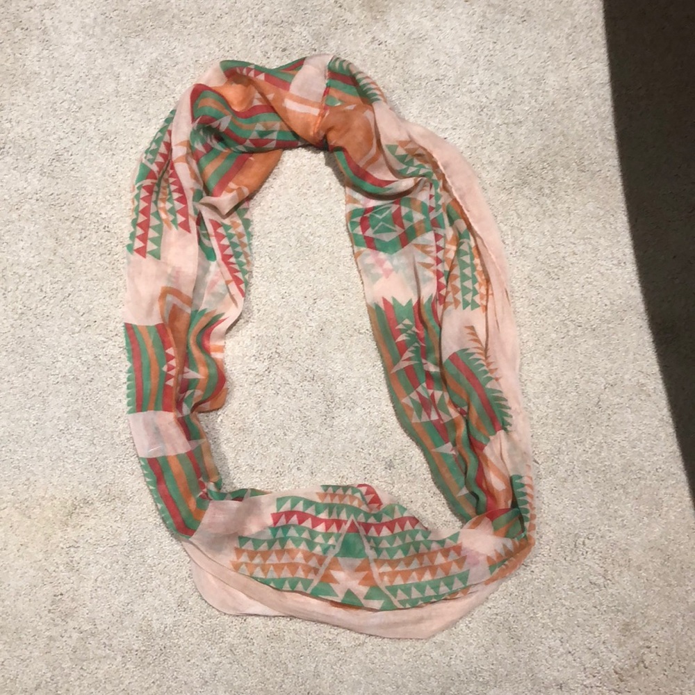 Rose colored infinity scarf with Aztec design